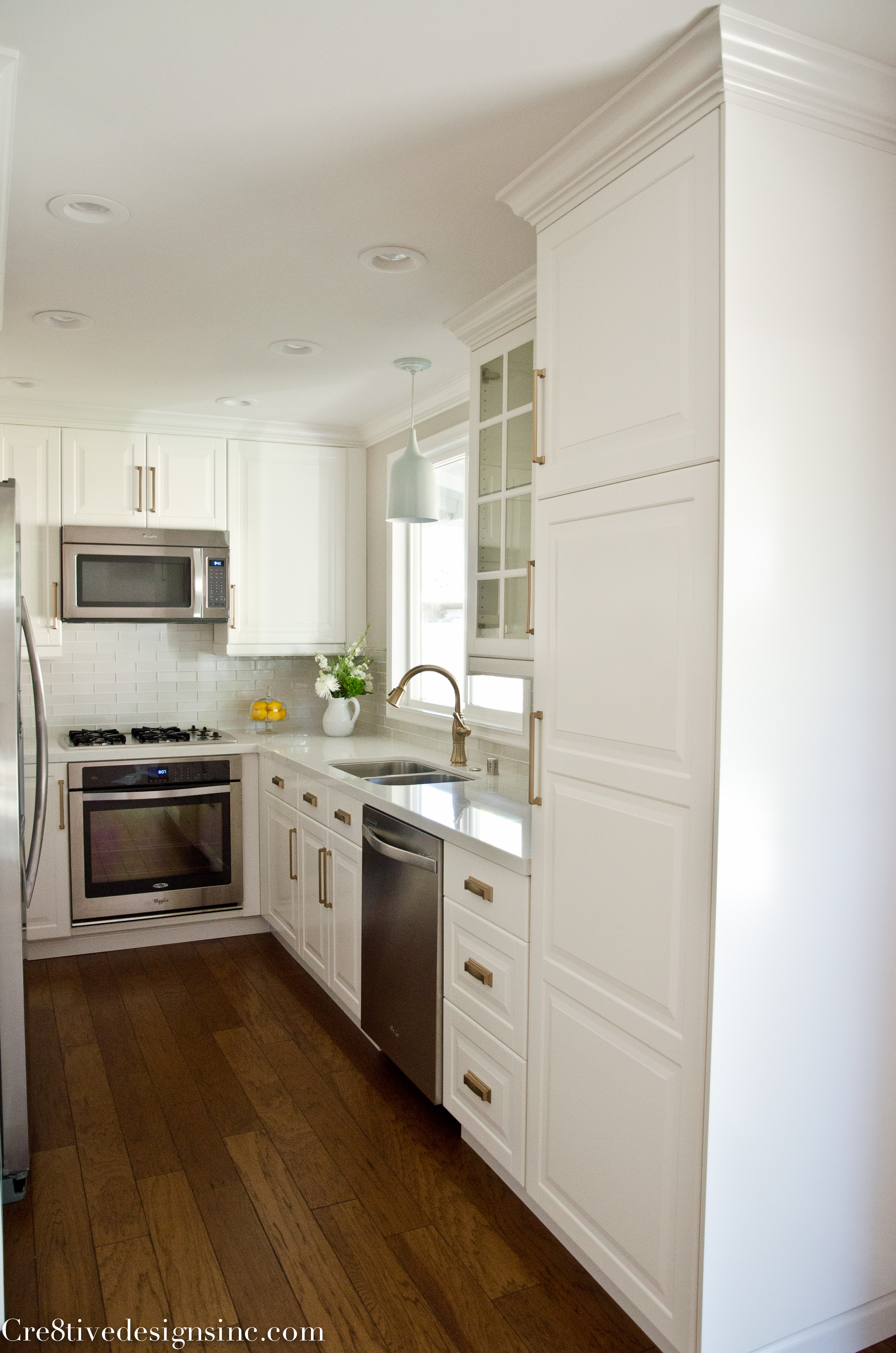 From white laminate kitchen to a green and white two-toned kitchen -  Cuckoo4Design