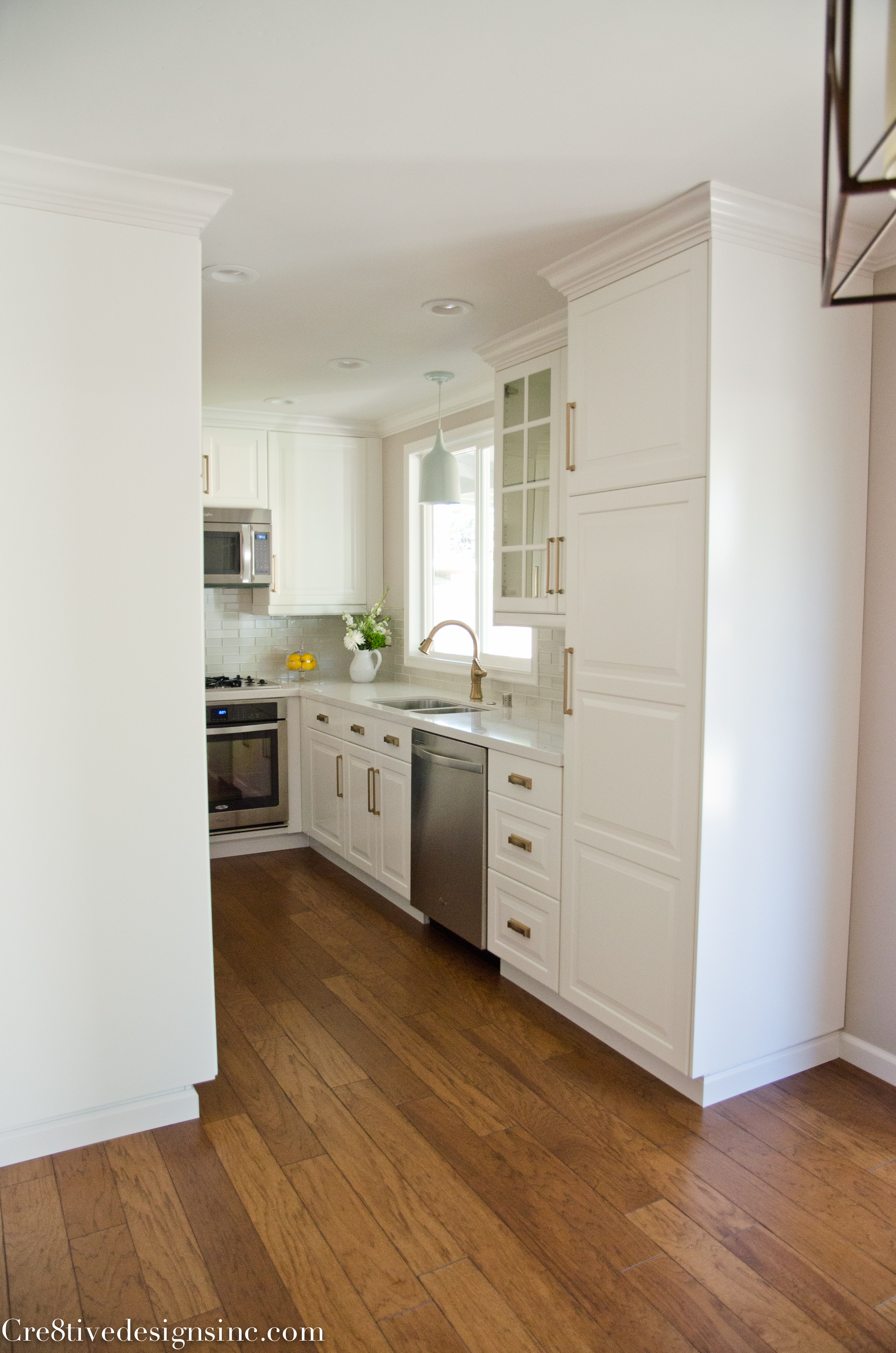 From white laminate kitchen to a green and white two-toned kitchen -  Cuckoo4Design