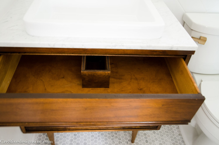 Using a piece of furniture for a bathroom vanity