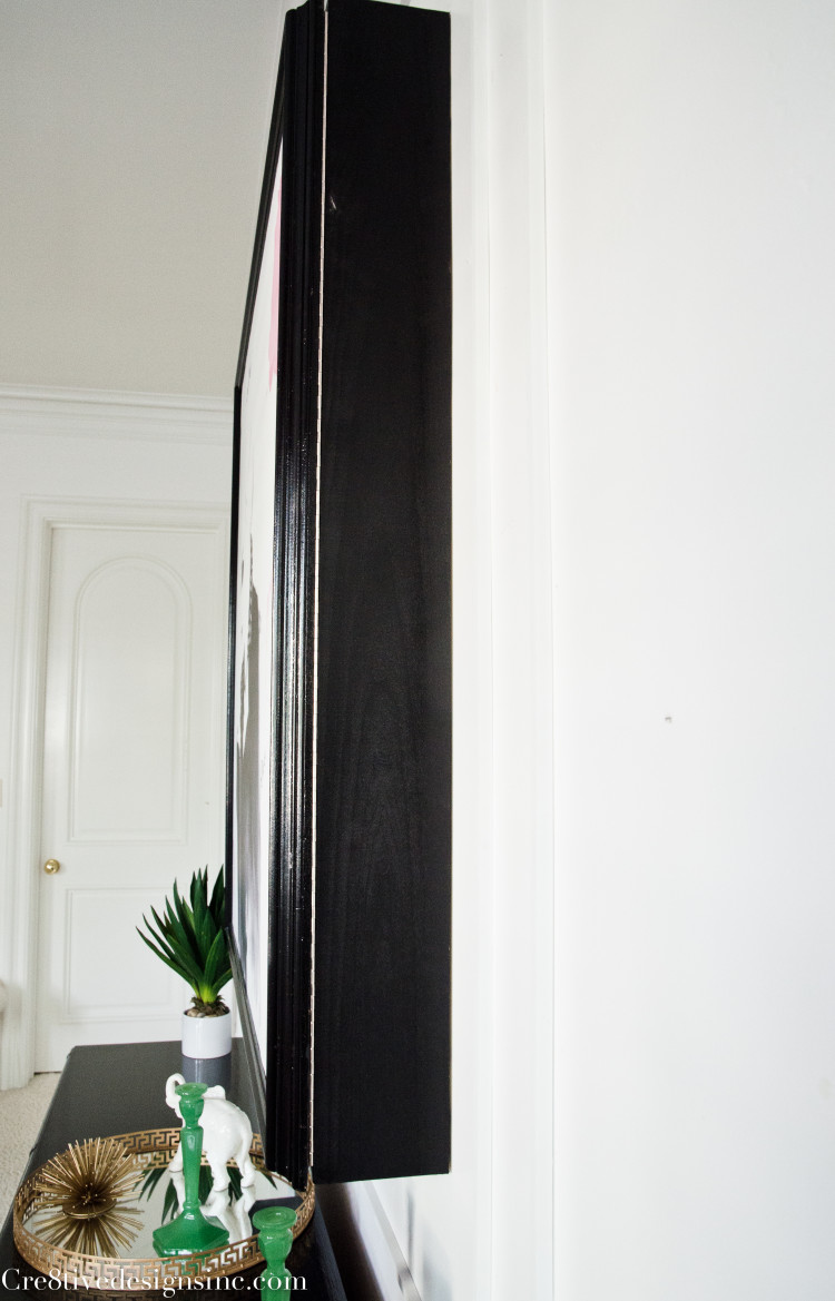 Using artwork to hide a tv