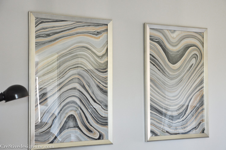 Marble artwork in silver frames